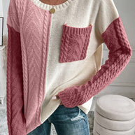 Color block round neck long sleeve sweater with pocket, pink and cream tones.