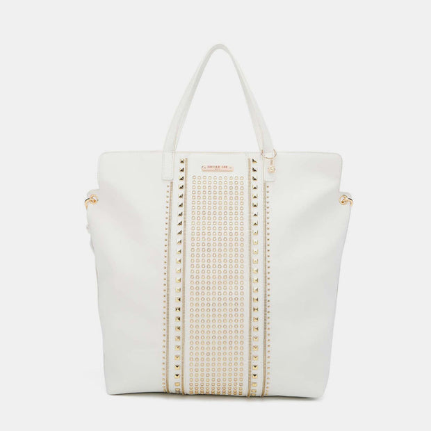 Nicole Lee USA studded large tote bag in vegan leather with top handles, pebbled exterior, and adjustable shoulder strap.