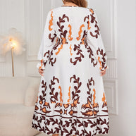 Plus size printed surplice dress with flounce sleeves, back view.