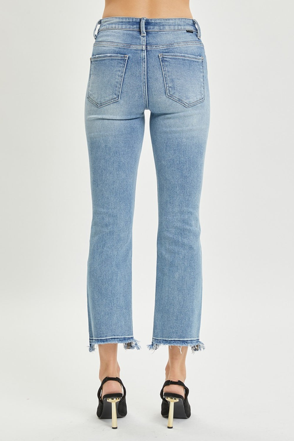 RISEN Full Size High Rise Distressed Cropped Straight Jeans with raw hem and pocket detail.