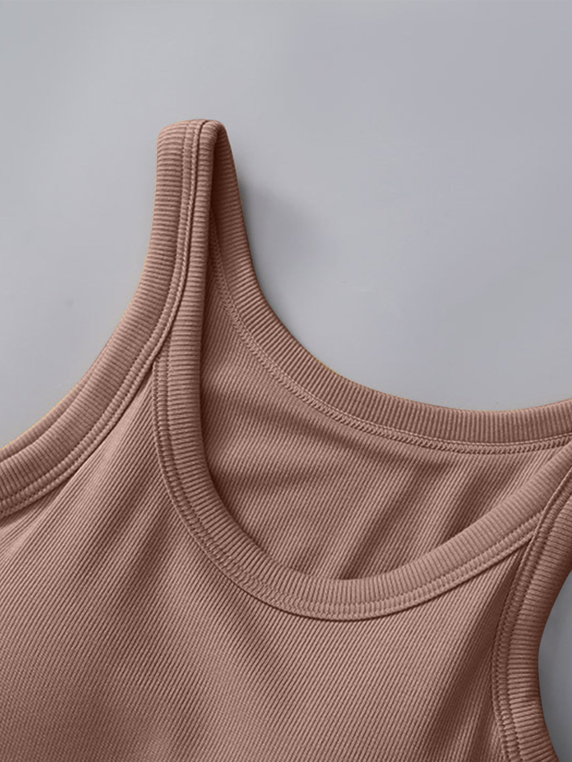 Round neck tank with moderate stretch and built-in bra, opaque viscose-spandex blend.