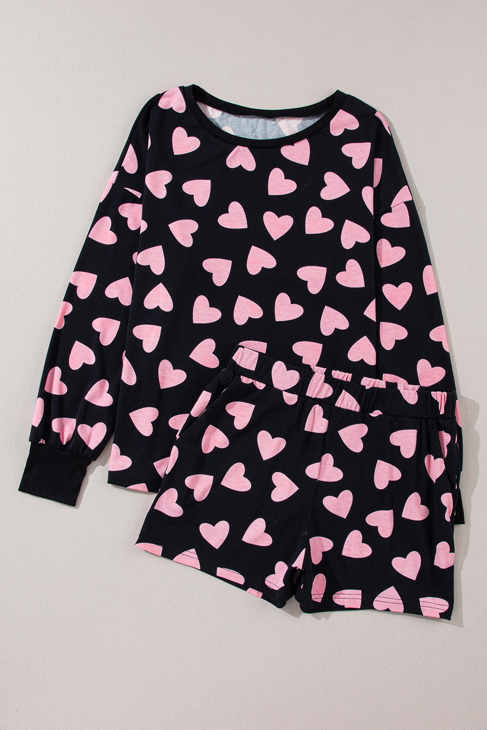 Heart print long sleeve top and shorts lounge set, black and pink.