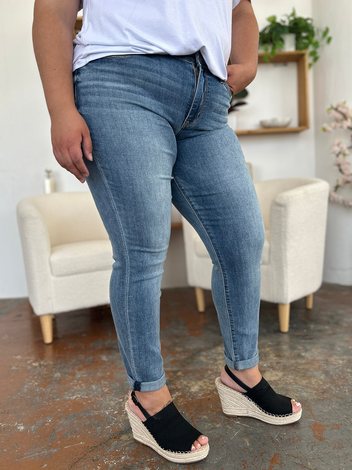 Judy Blue full size cuffed hem slim jeans with stretchy denim, shown with black sandals.