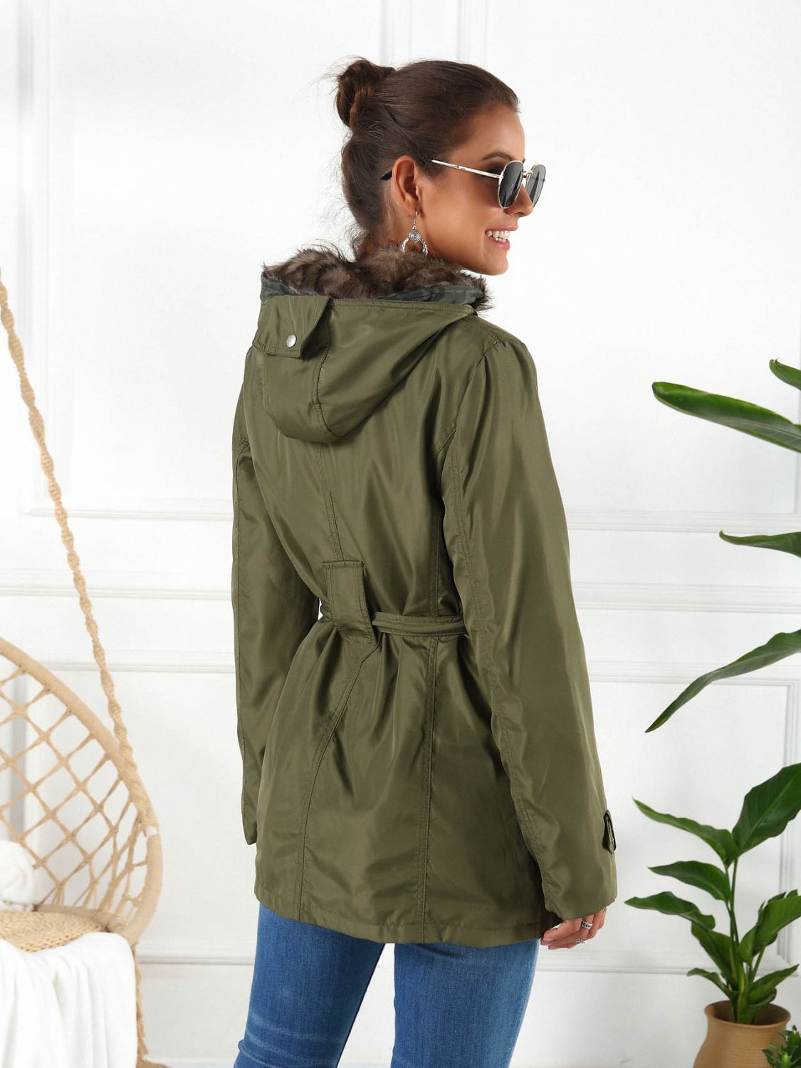 Ivy Lane Full Size Hooded Jacket with Detachable Liner, pocketed and buttoned, shown in green, back view.