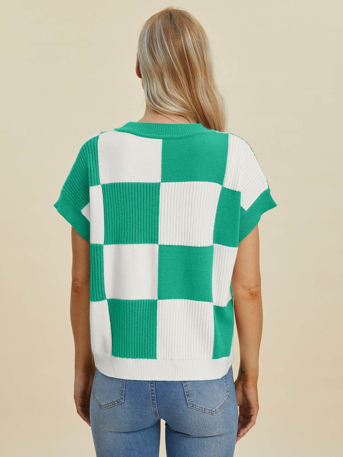 Full size checkered round neck short sleeve sweater in green and white, back view.