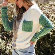 Color Block Round Neck Long Sleeve Sweater with pockets, slightly stretchy, in a nature setting.