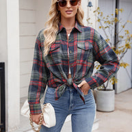 Mandy Plaid Button Up Long Sleeve Shirt with pockets and buttoned front, styled with jeans, outdoor background.