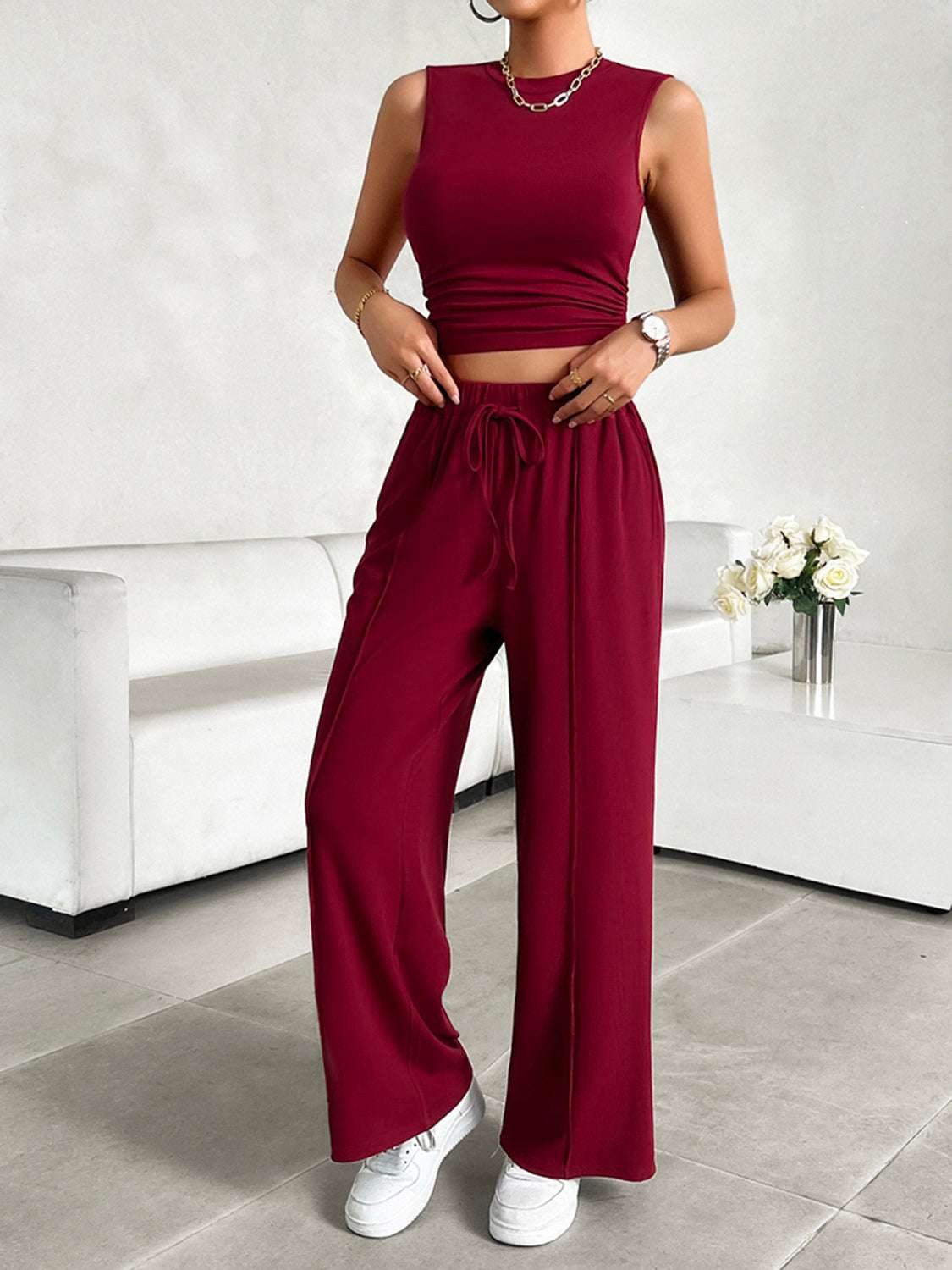 Devine Mock Neck Sleeveless Top and Drawstring Pants Set in burgundy, highly stretchy and pocketed design.