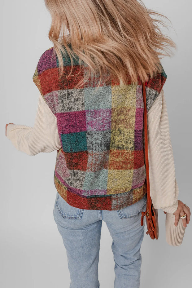 Plaid zip-up collared neck vest coat in multicolored pattern on a person wearing jeans.