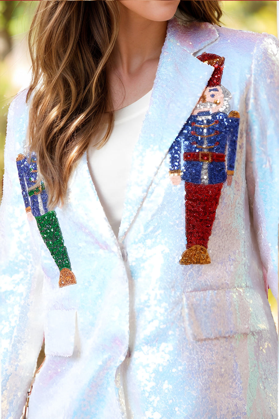 Sequin Nutcracker Long Sleeve Blazer with embroidered nutcracker design.