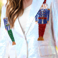 Sequin Nutcracker Long Sleeve Blazer with embroidered nutcracker design.