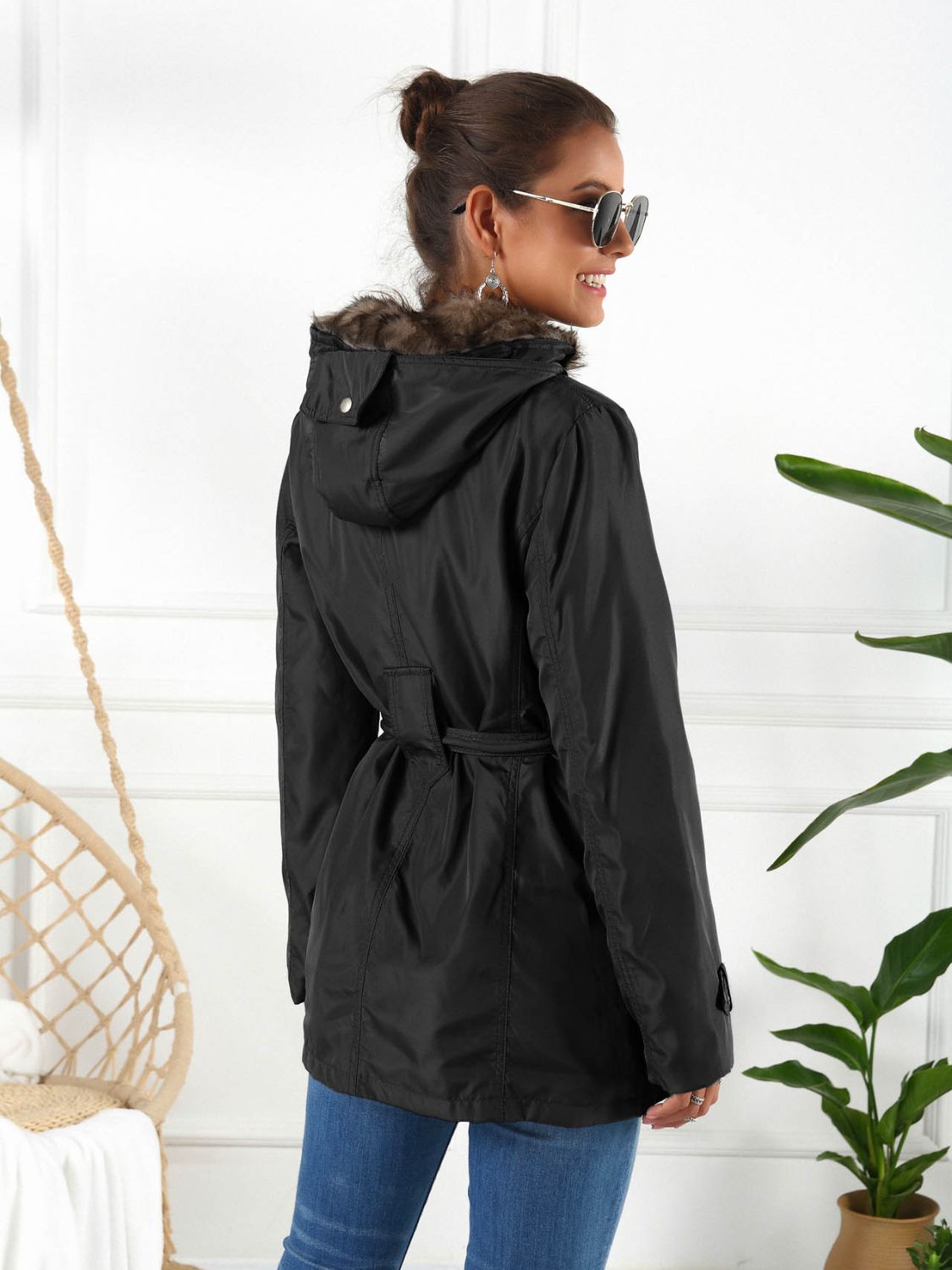 Ivy Lane Full Size Hooded Jacket with Detachable Liner, black color, shown from the back.