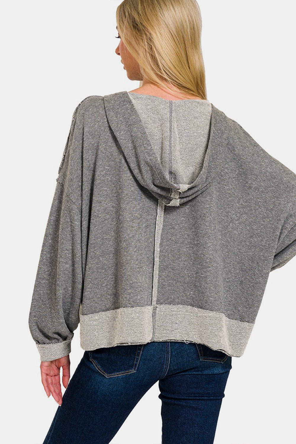 Zenana Contrast Trim Slit Hoodie with gray and white trim and side slits.