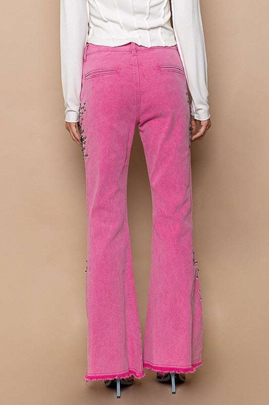 POL Raw Hem Embroidered Flare Pants in pink with intricate embroidery and raw hem design.