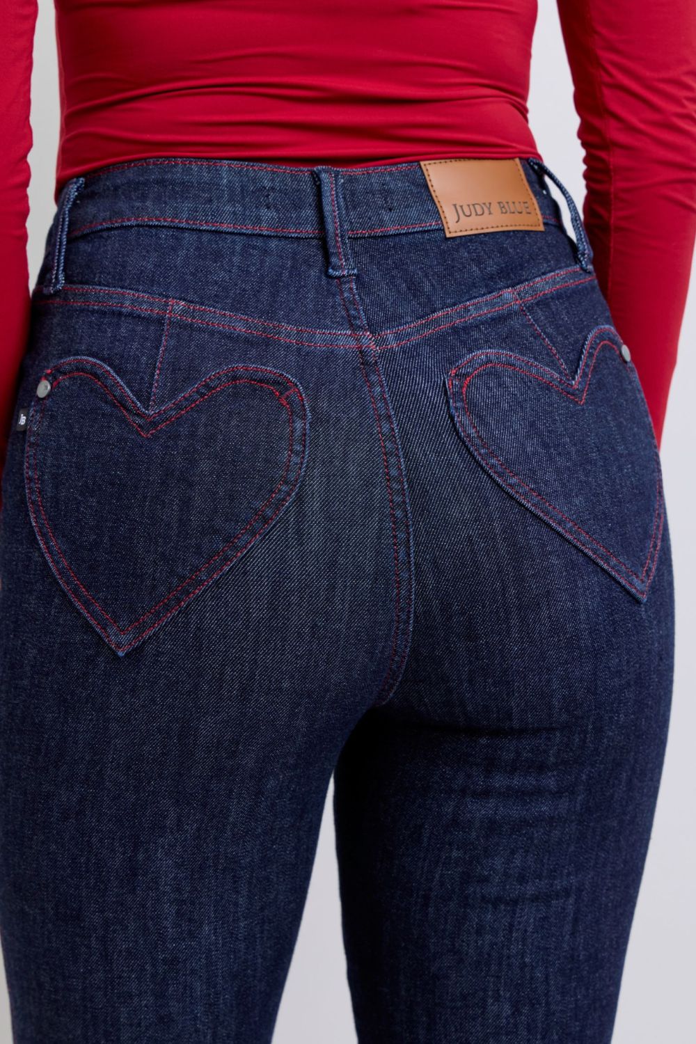 Judy Blue skinny jeans with heart-shaped back pockets, high-rise fit, and moderate stretch.