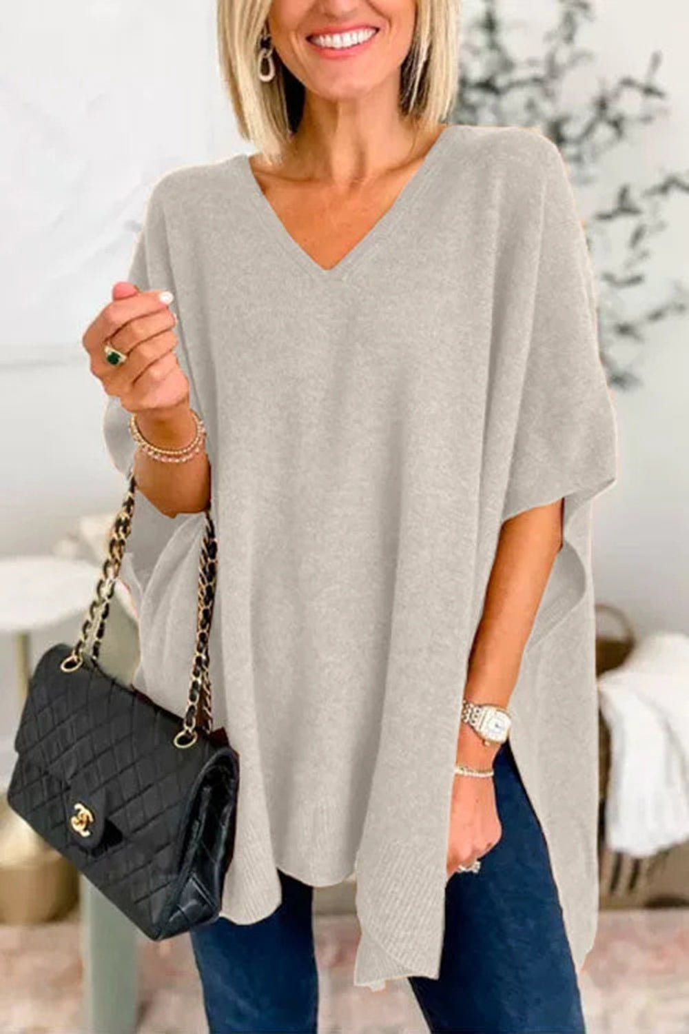 Slit V-Neck Half Sleeve Knit Top in light gray, slightly stretchy viscose blend, styled with black handbag.