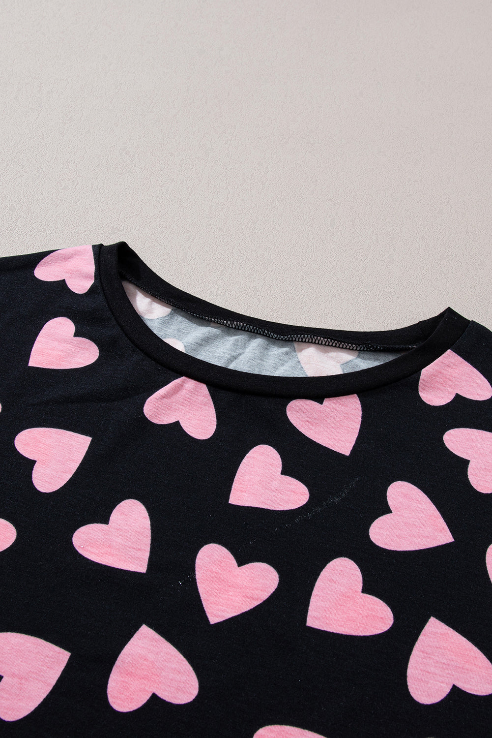 Heart print long sleeve top, pink hearts on black fabric, loungewear set.