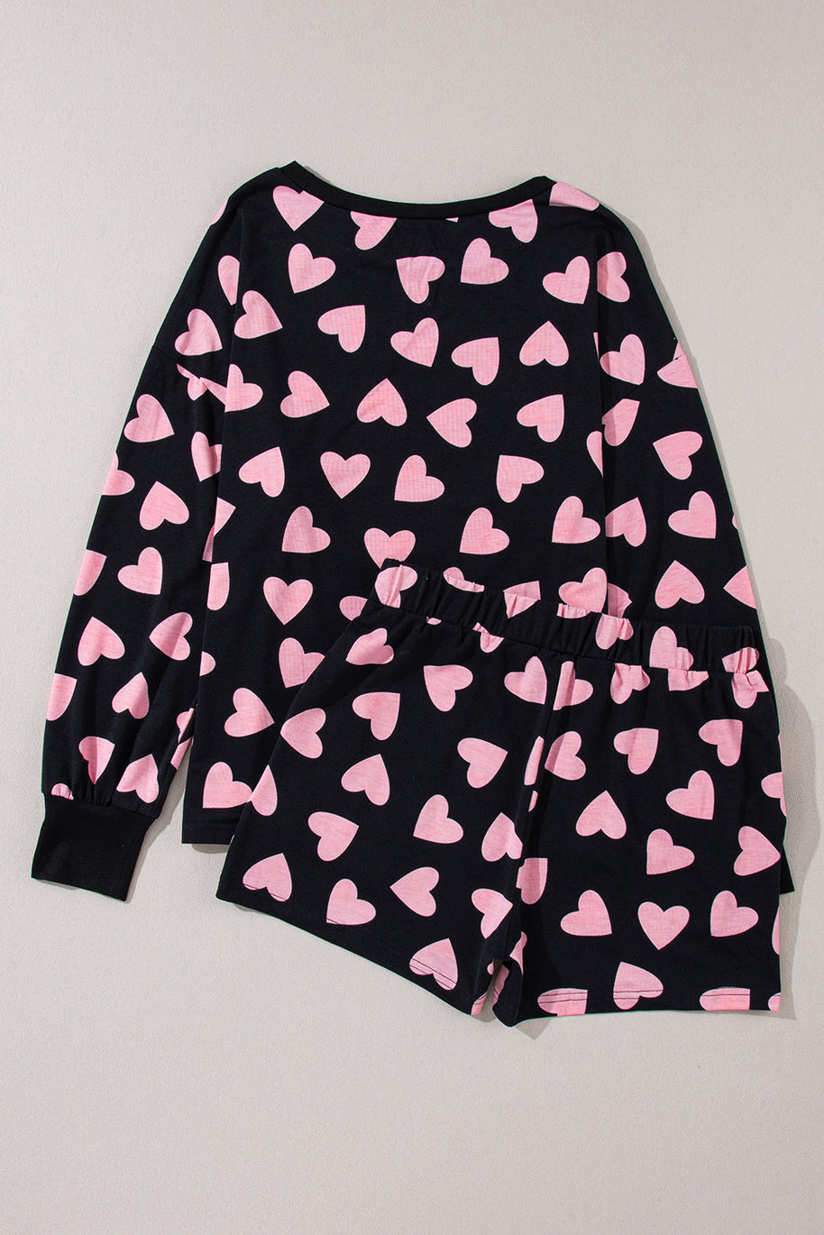 Heart print long sleeve top and shorts lounge set in black with pink hearts.