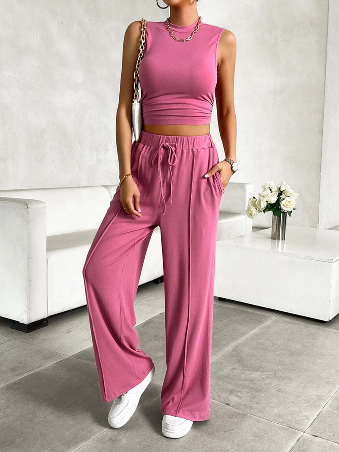 Devine Mock Neck Sleeveless Top and Drawstring Pants Set in pink, highly stretchy fabric, pocketed design.