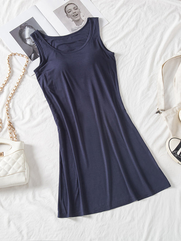 Round neck wide strap mini tank dress with moderate stretch.