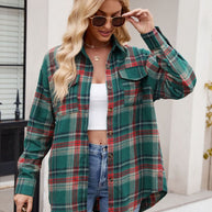 Green and red plaid button-up long sleeve shirt with pocket details.