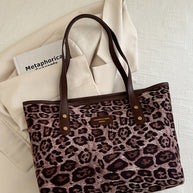 Leopard Polyester Tote Bag with brown handles, large size for versatile use.