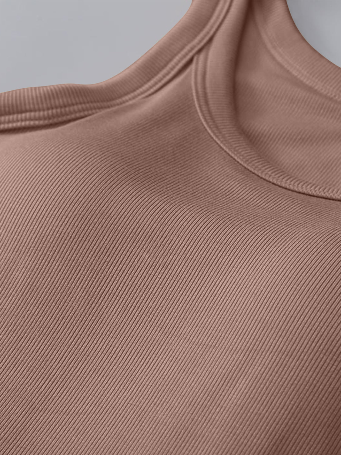 Round neck tank top with moderate stretch fabric in beige.