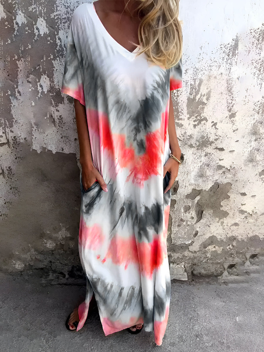 Full size pocketed tie-dye short sleeve dress in vibrant colors, featuring a slightly stretchy material.